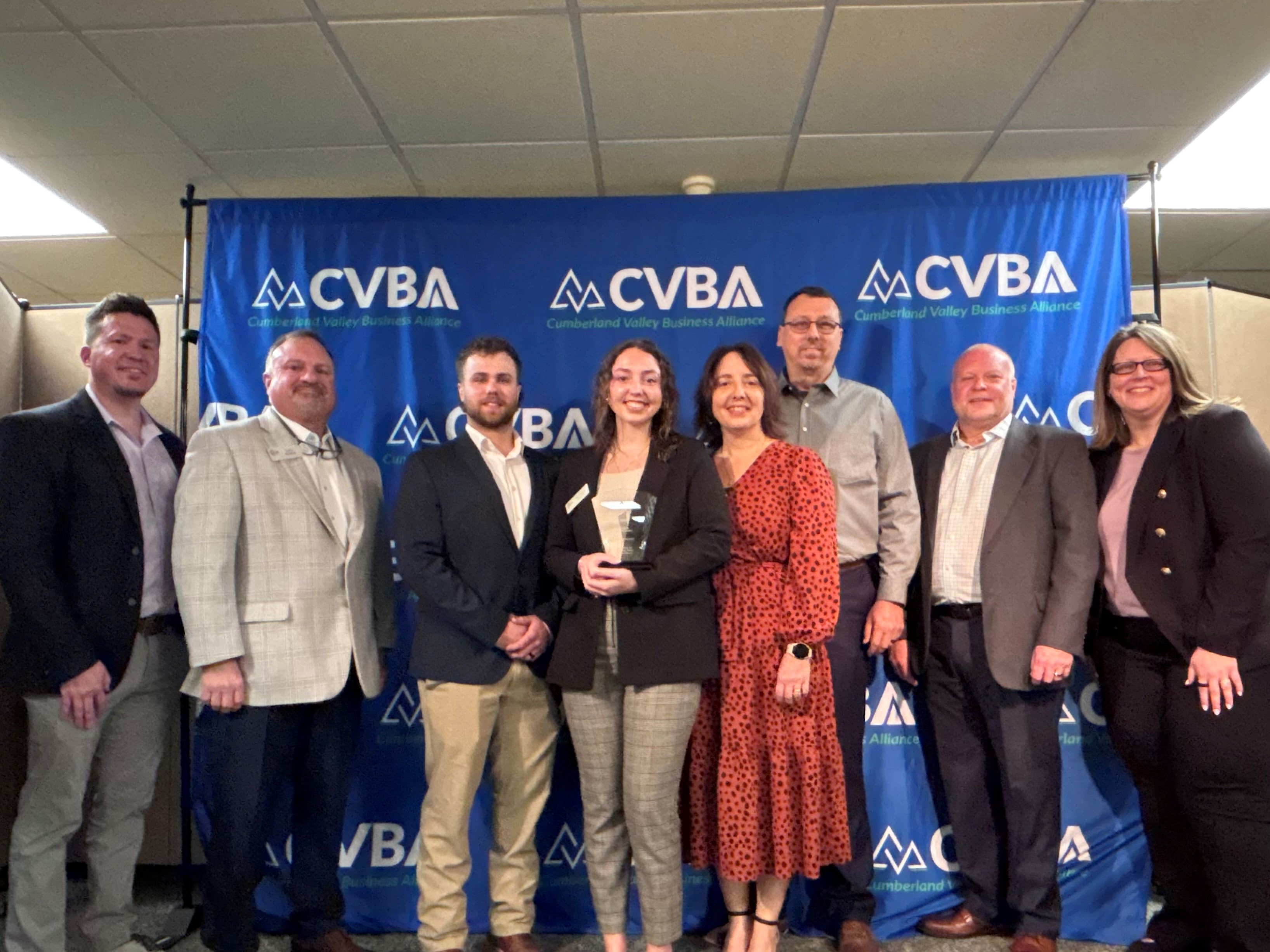 Morgan Horst with award with others