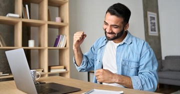 happy guy with computer