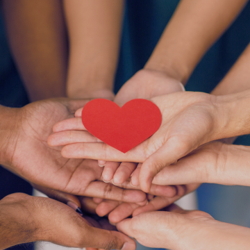 people hands with red heart