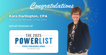 woman in business attire on blue background for award