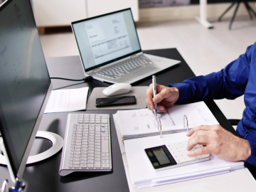 man performing accounting duties