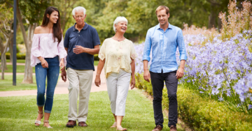 Blended family walking in a garden