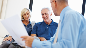 couple reviewing papers
