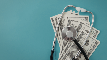 stethoscope over money