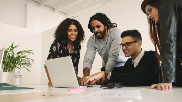 group looking at a computer