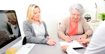 people at an estate meeting