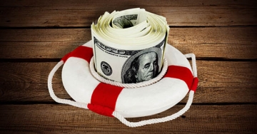money in a life preserver