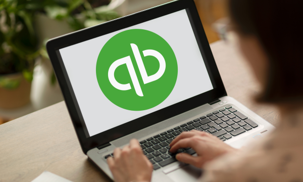 laptop screen with quickbooks logo