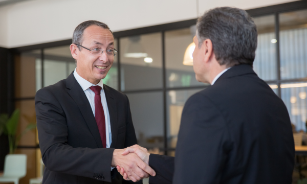 two men shaking hands