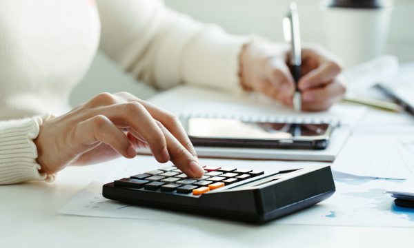 woman using a calculator 
