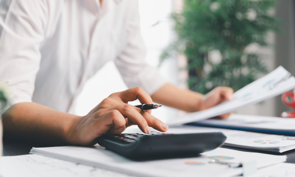 man using calculator