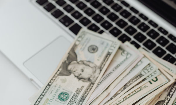 money on laptop