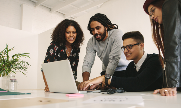 group looking at a computer