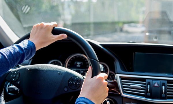 hands on a steering wheel