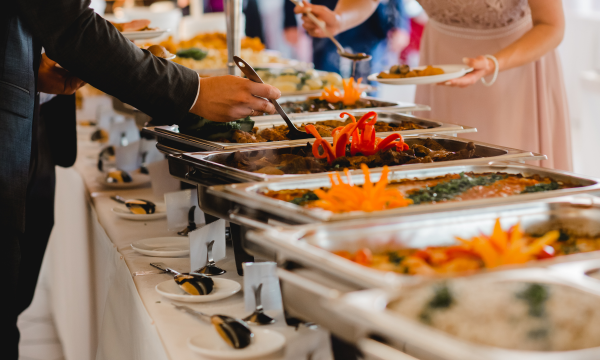 people making plates at an event