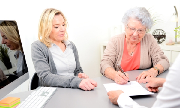 people at an estate meeting