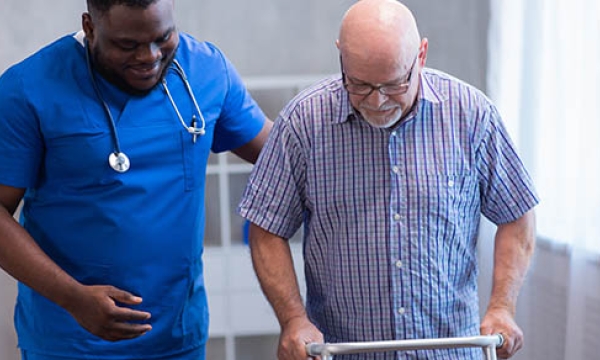 man walking with nurse