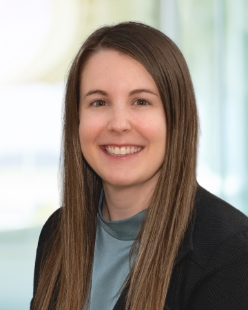 woman in green shirt