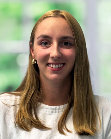 woman with blonde hair white shirt