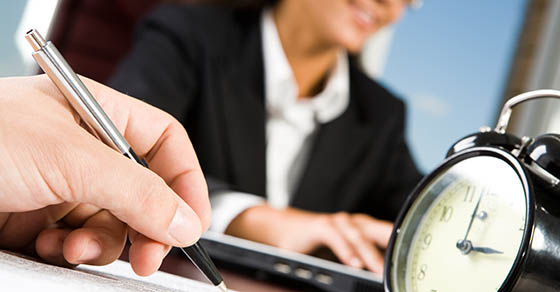people working with clock