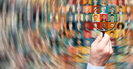 magnifying glass on people