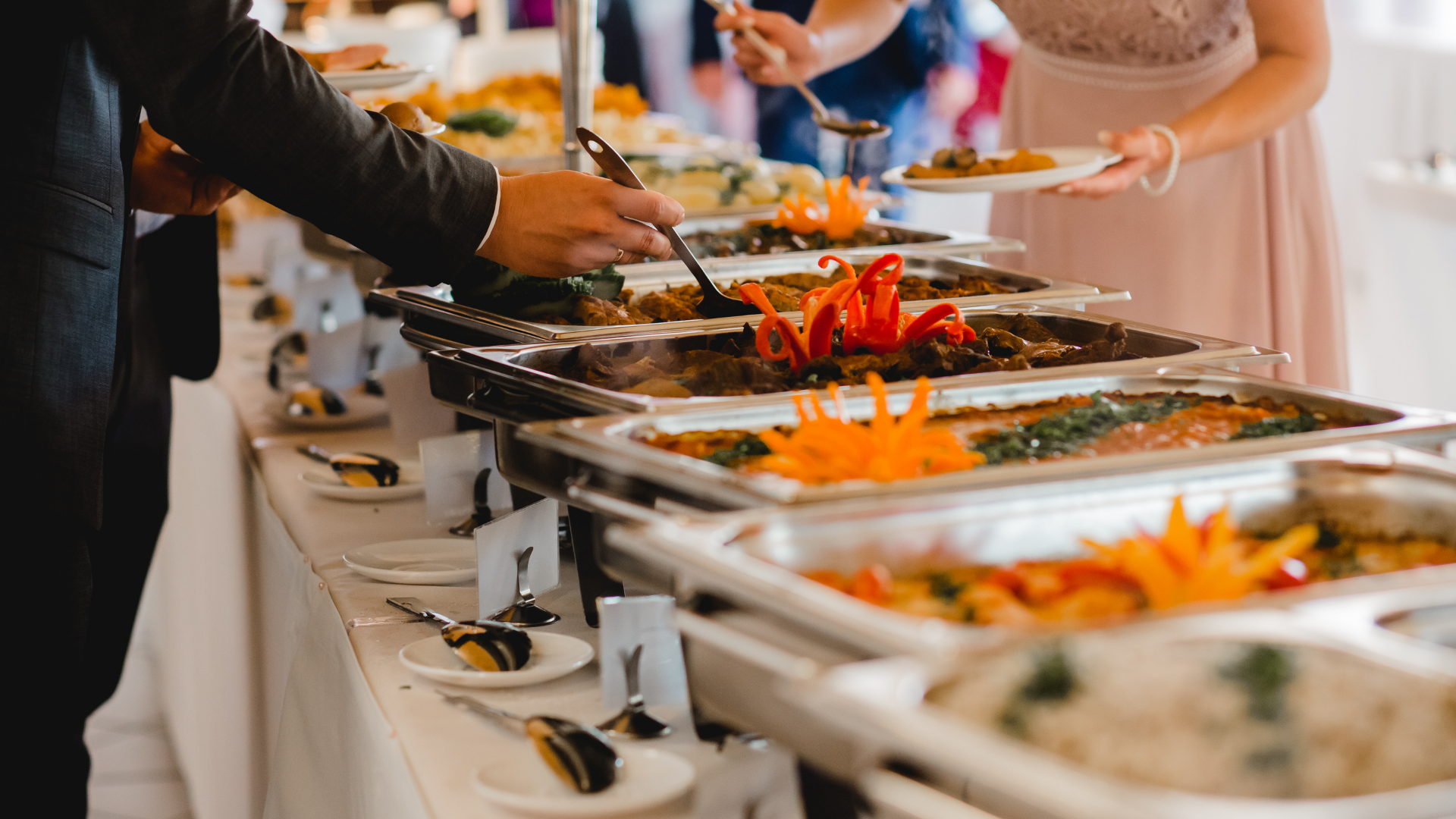 people making plates at an event
