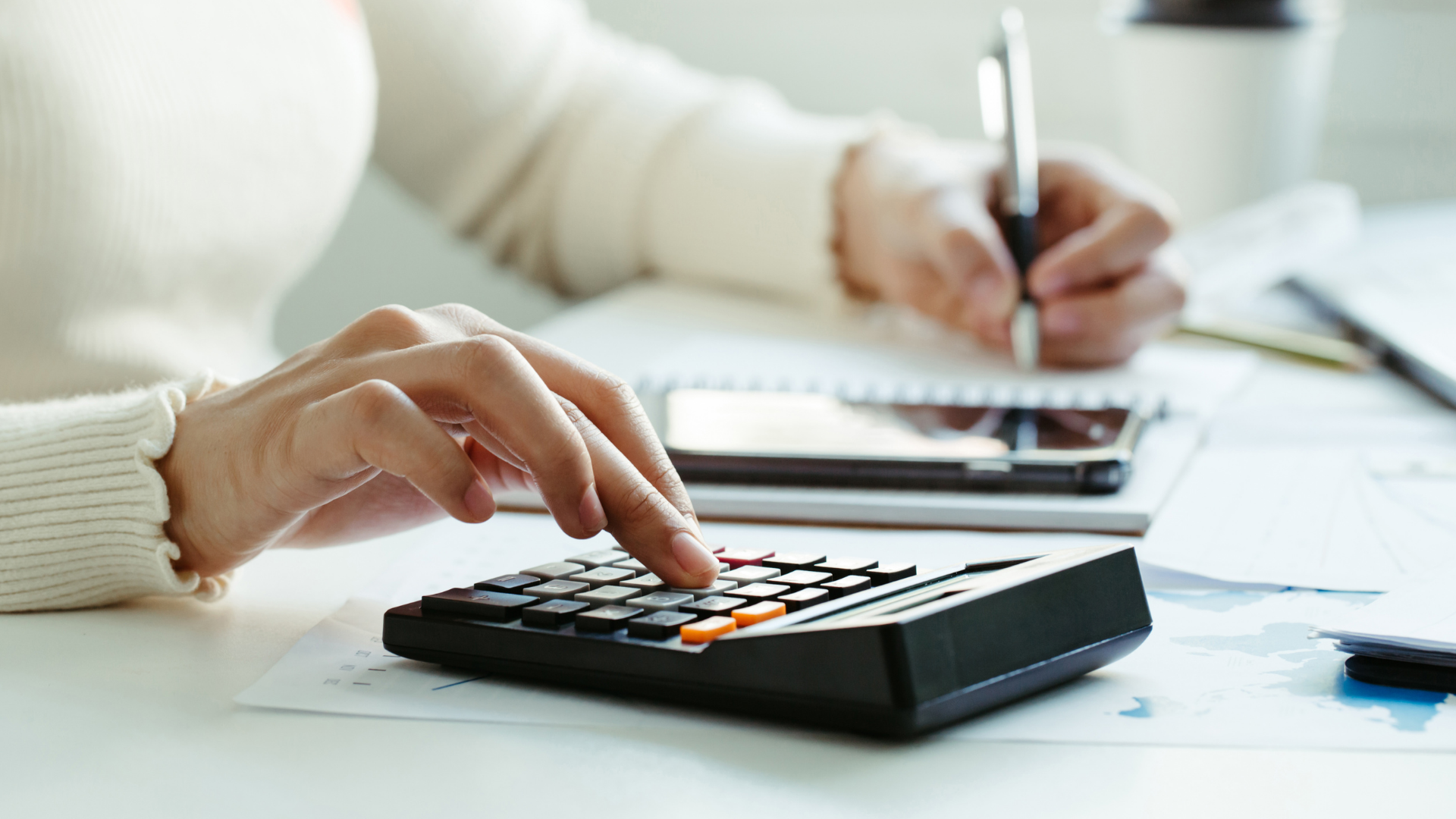 woman using a calculator