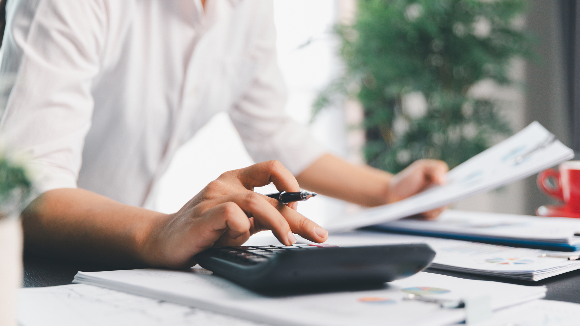 man using calculator
