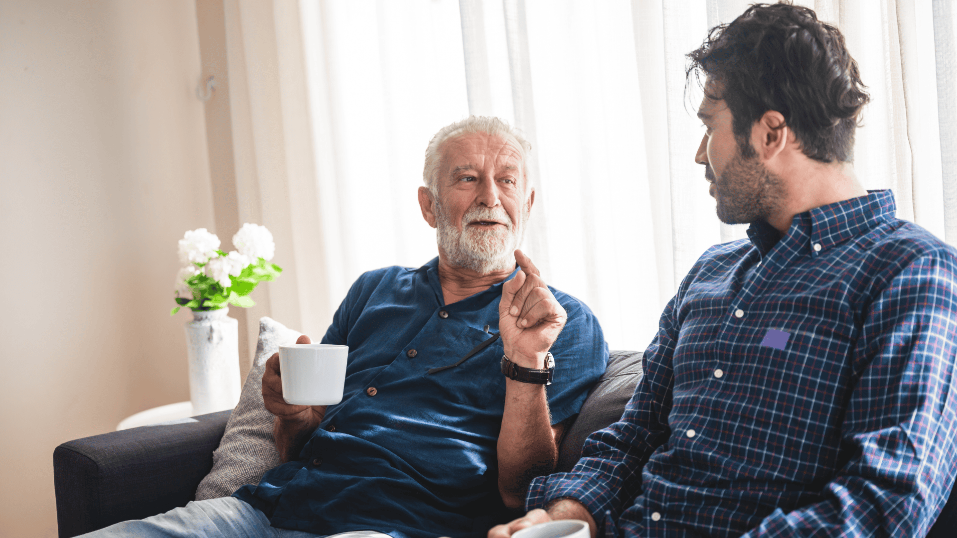 Multigenerational conversation between two men