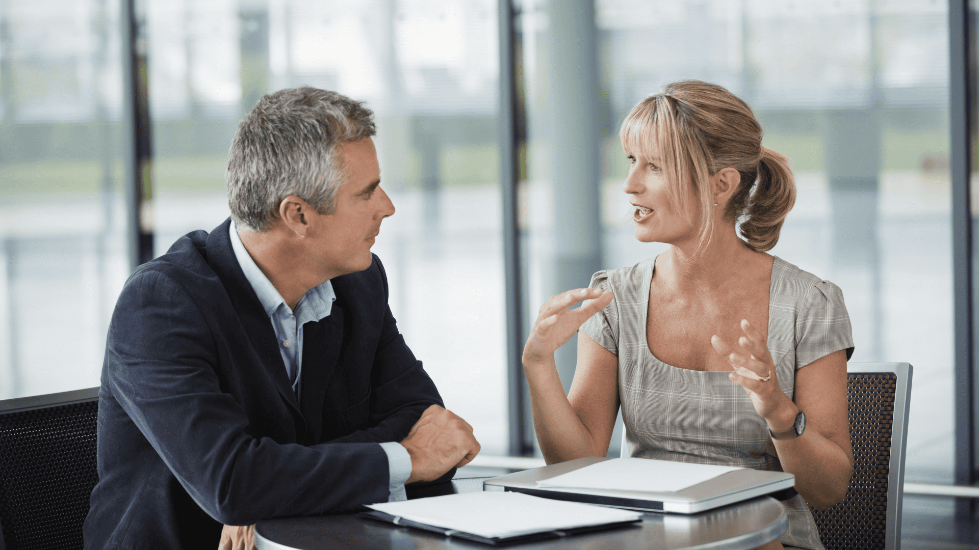 Man and woman meeting at a desk