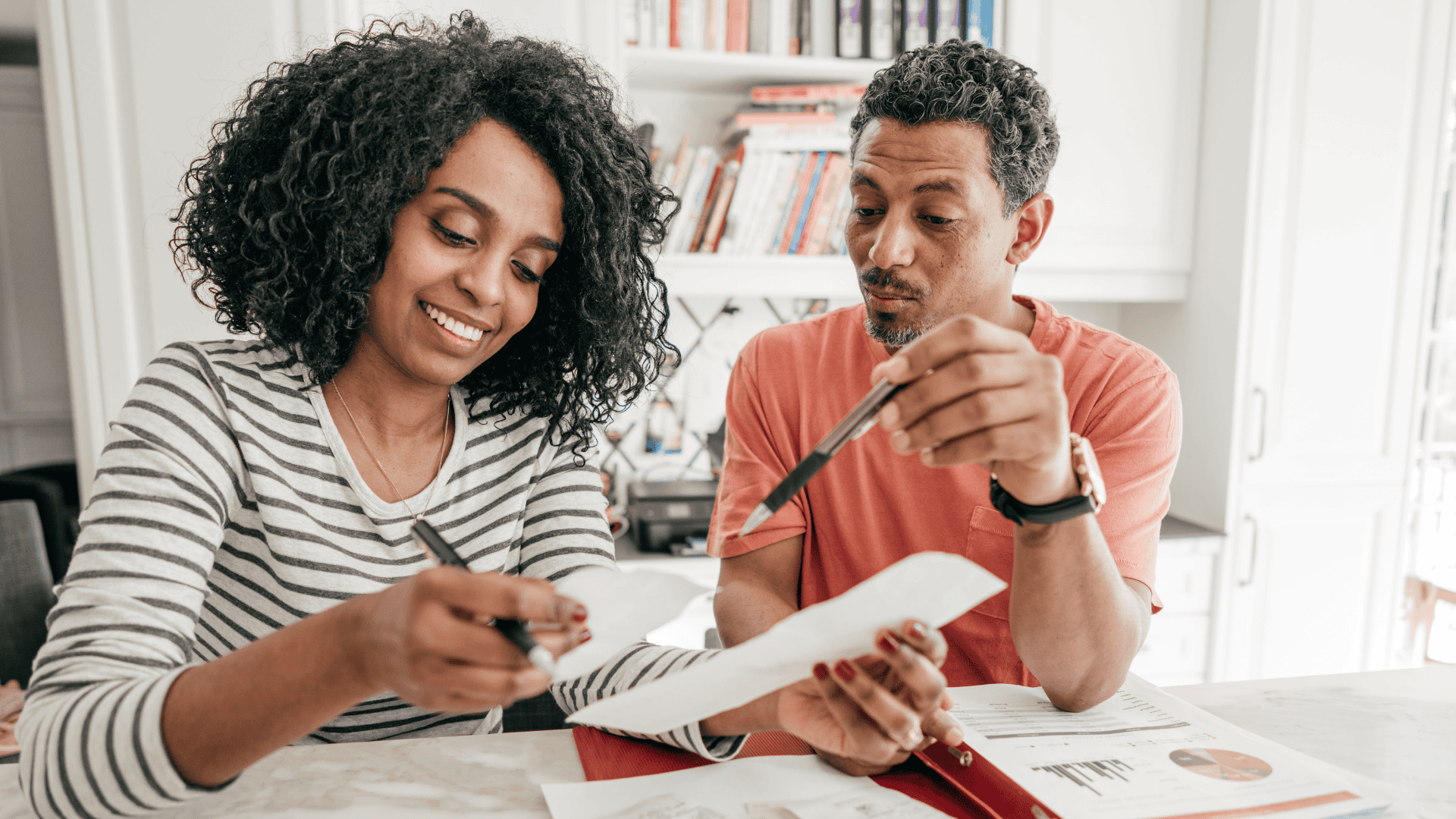 Man and woman reviewing paperwork
