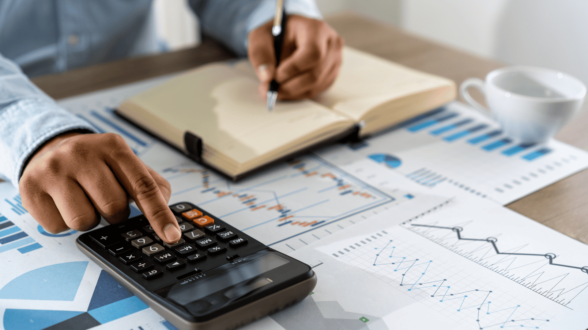 using a calculator while looking at paperwork