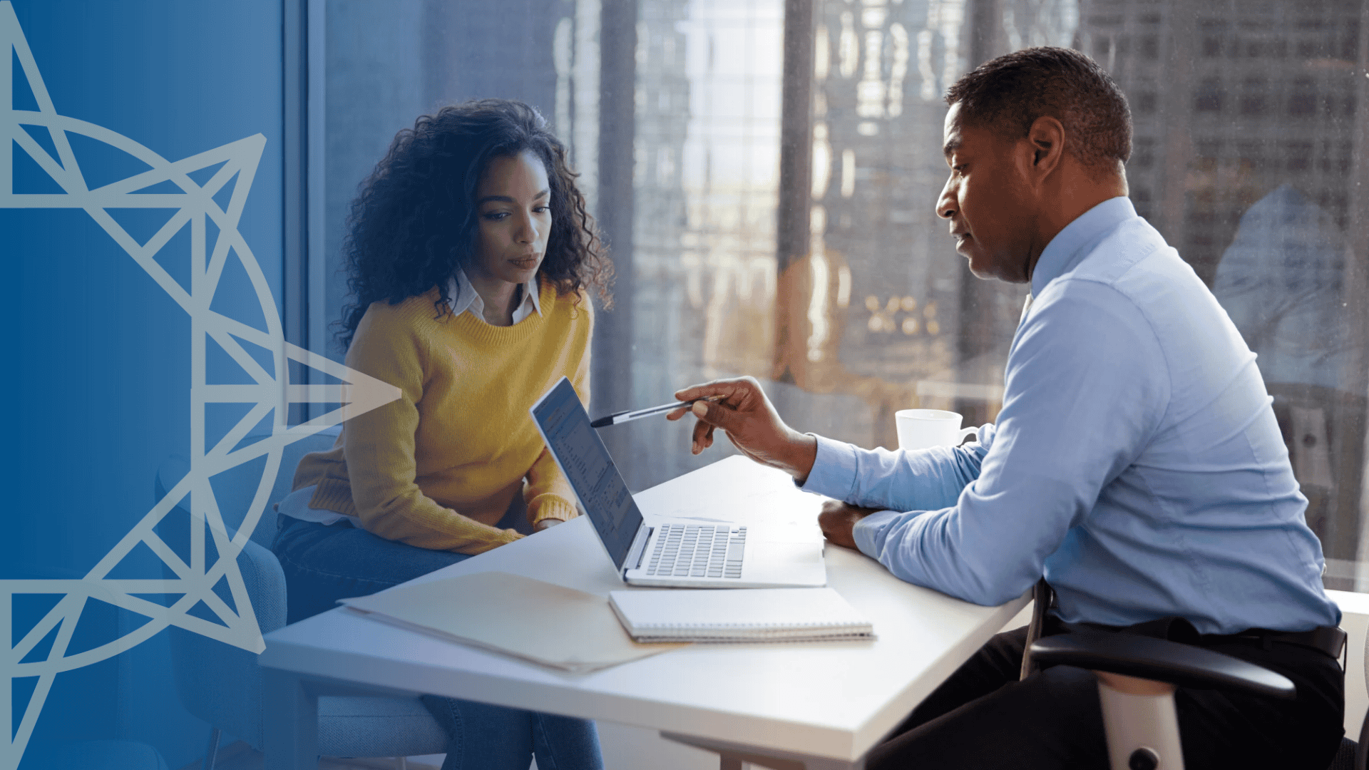 Man and woman meeting at a desk