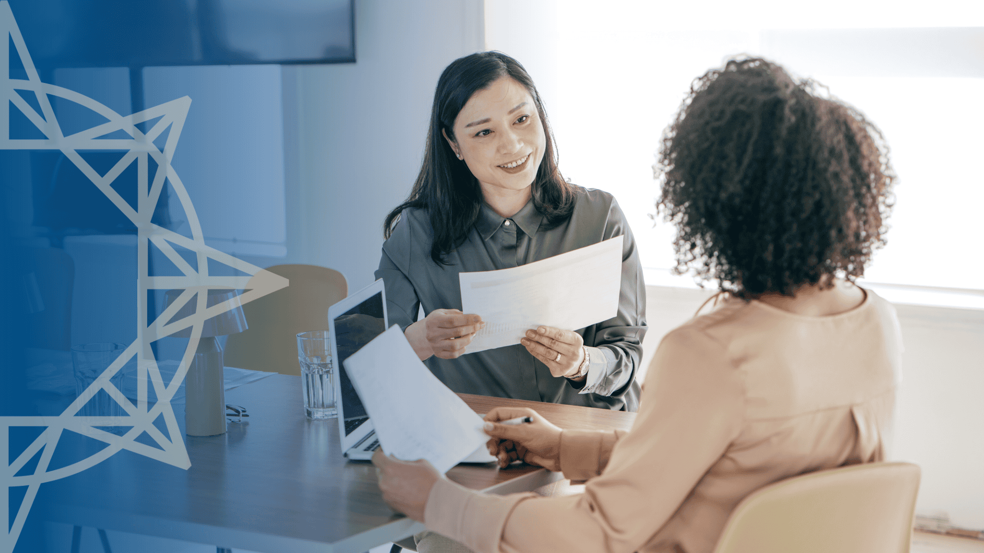 two women sitting in an interview