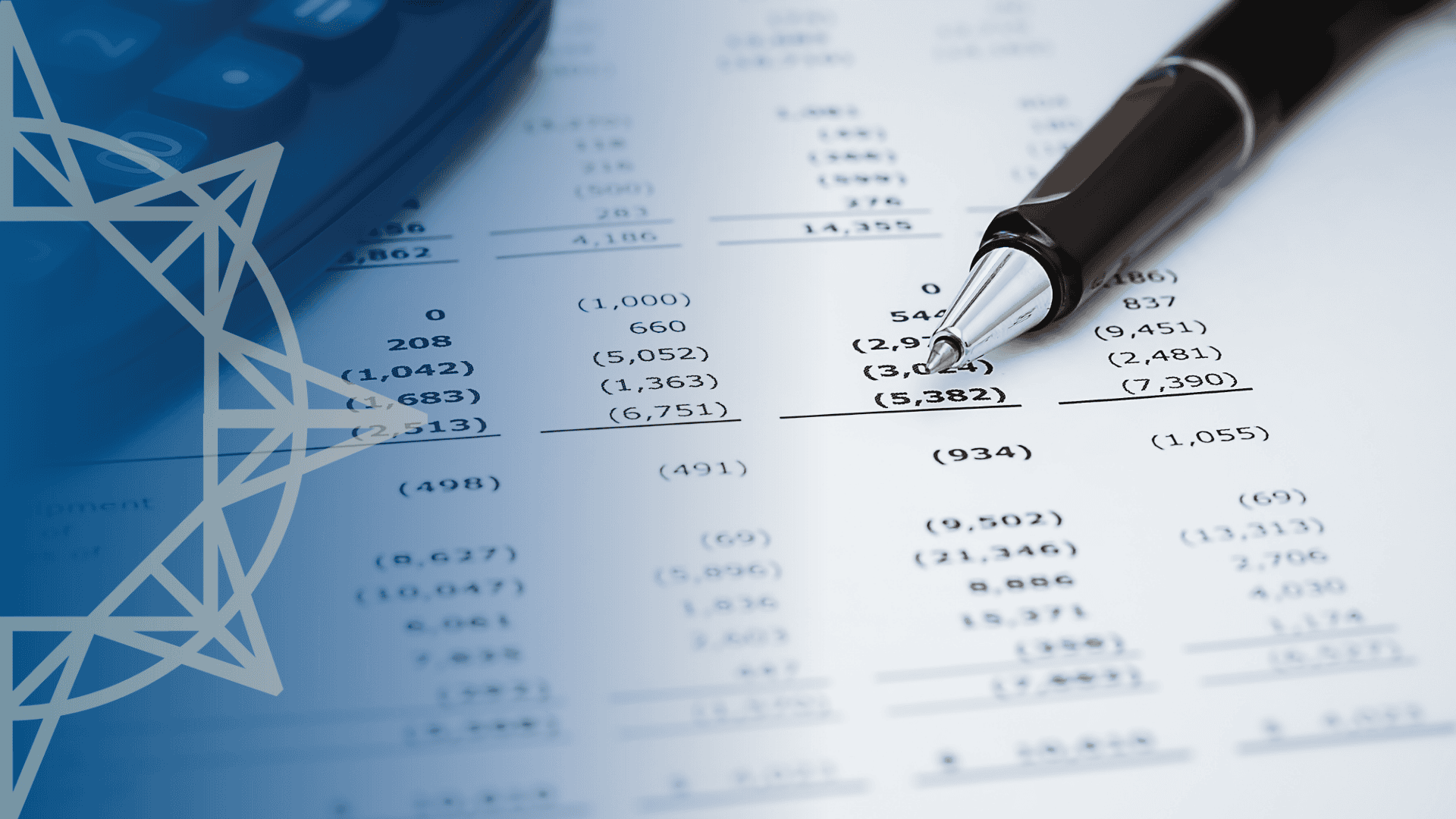black pen laying on a printed financial statement